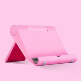 a pink tablet with a pink background