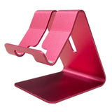 a pink tablet stand with a red surface