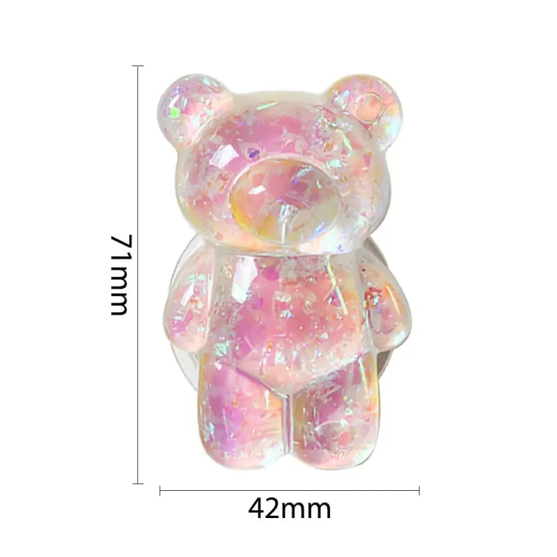 a pink teddy bear with a white background