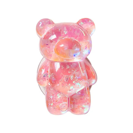 a pink teddy bear with a white background