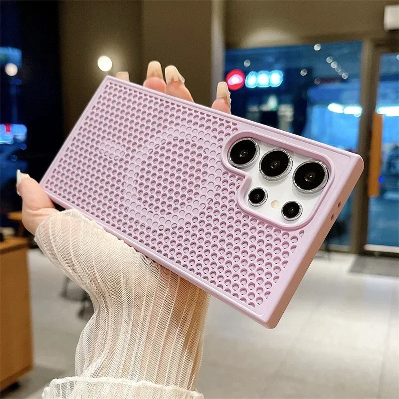 Pink textured smartphone case with multiple camera cutouts.