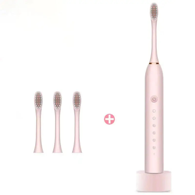 a pink toothbrush with three different brushes