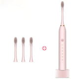 A pink toothbrush with three different brushes