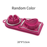 a pink tray with a hat and a pair of scissors