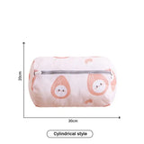 a pink and white cosmetic bag with a cartoon face on it