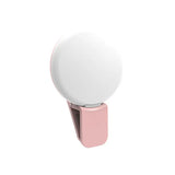 a white and pink knob with a round knob
