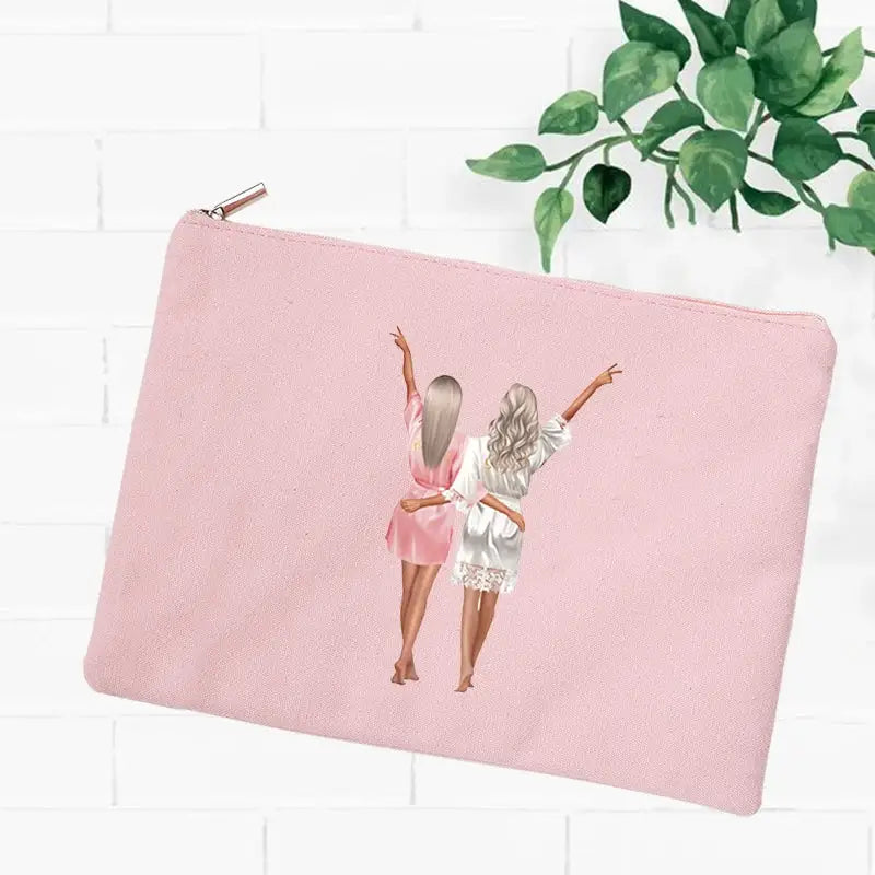 a pink zipper bag with a watercolor illustration of a girl dancing