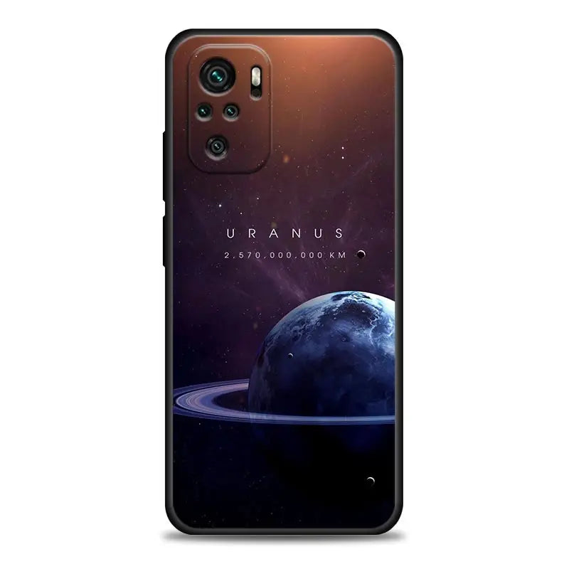 a close up of a cell phone with a planet on it