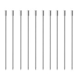 a group of six metal needles sitting next to each other