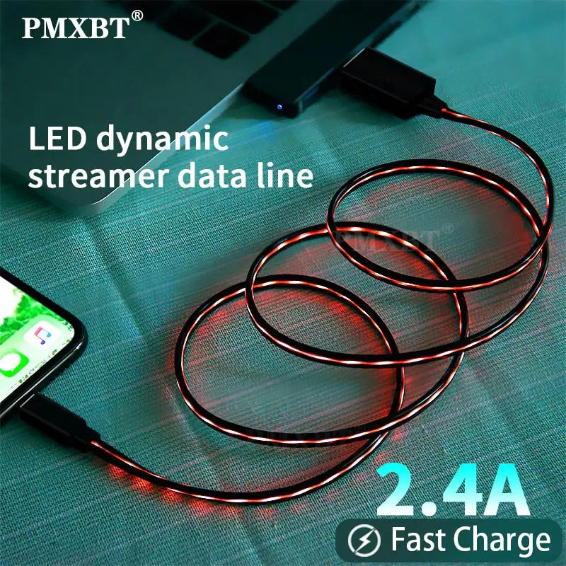 there are three cables connected to a cell phone on a table