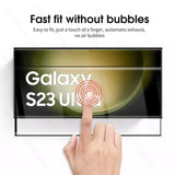 a hand pointing at a screen with the text galaxy