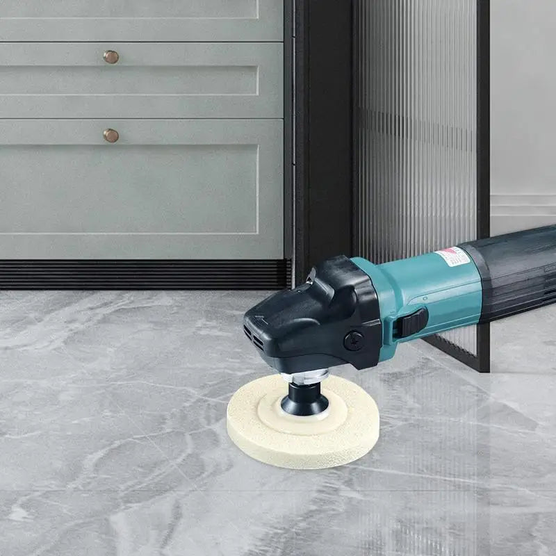 a angle angle grinder on a marble floor