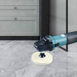 a angle angle grinder on a marble floor