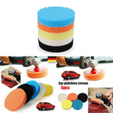 a picture of a car polishing sponge with a car in the background