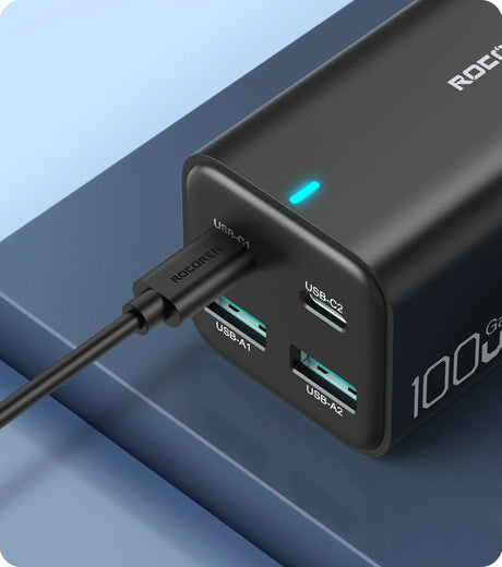 Portable battery pack or power bank with multiple USB ports and a USB-C input.