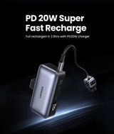 Portable power bank with a charging cable attached.