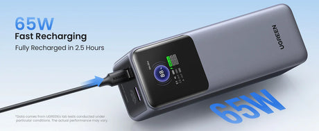 Portable power bank with a digital display showing charging status and percentage.