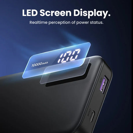 Portable power bank with an LED screen displaying battery percentage and capacity.