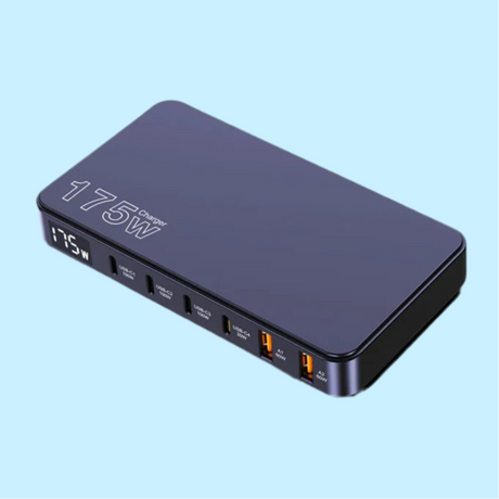 Portable power bank with multiple USB ports and a digital display.