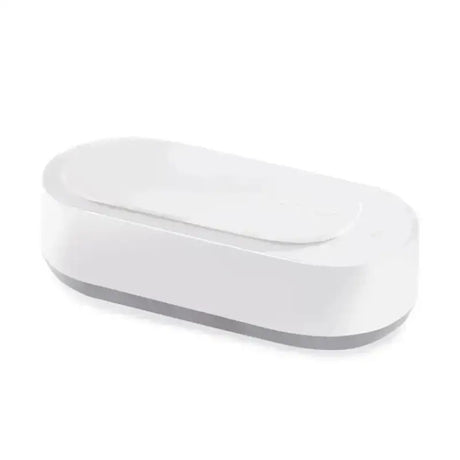 a close up of a white rectangular dish on a white surface