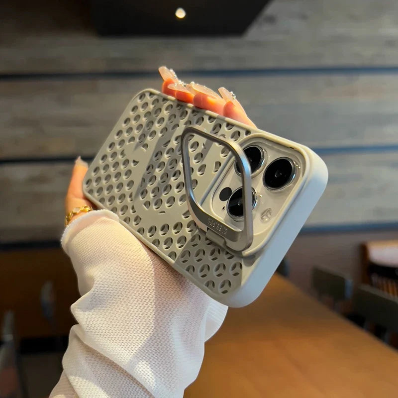 Protective phone case with a perforated design and camera cutouts.