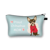 a small bag with a chihuahua dog wearing a red sweater