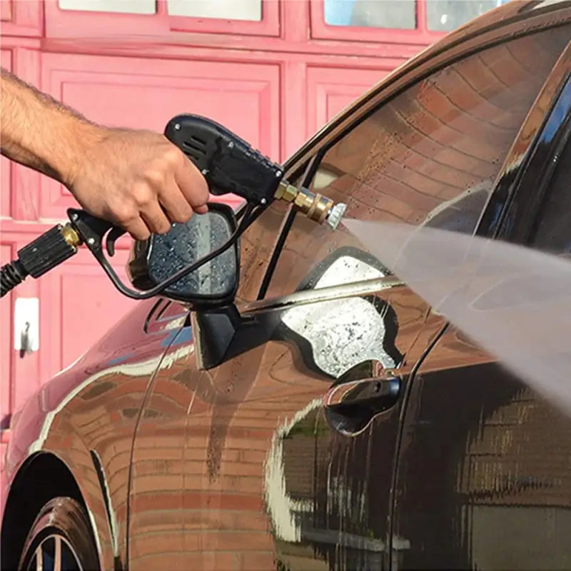 a man is pumping gas into his car