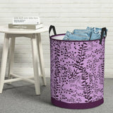 purple and black floral print fabric storage bin