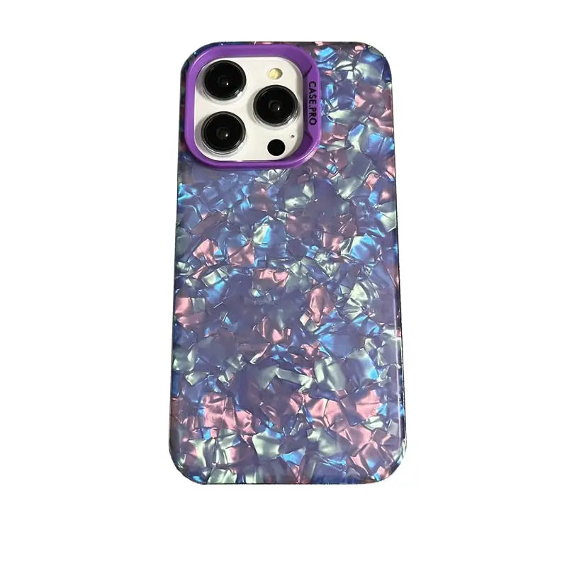 the back of a purple phone case with a pattern of blue and pink crystals