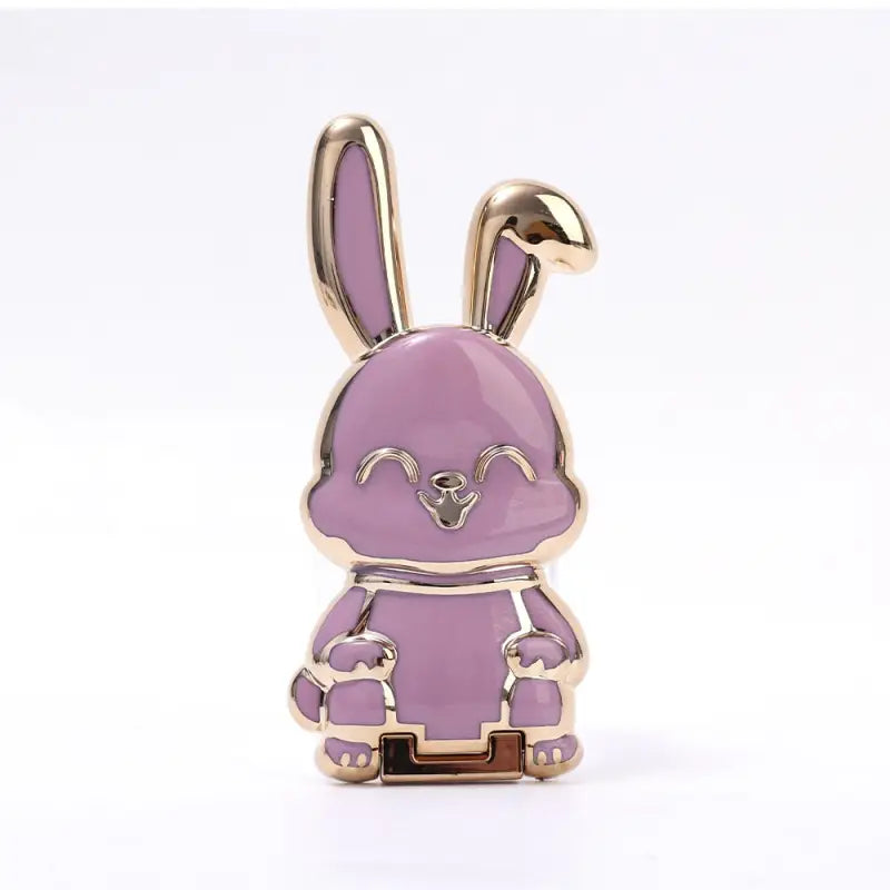 a purple rabbit with a gold plated head