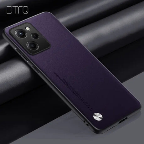 The back of a purple case with a black background