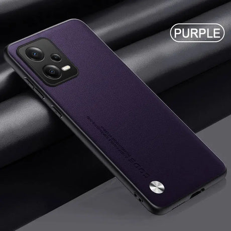 The back of a purple case with a black background