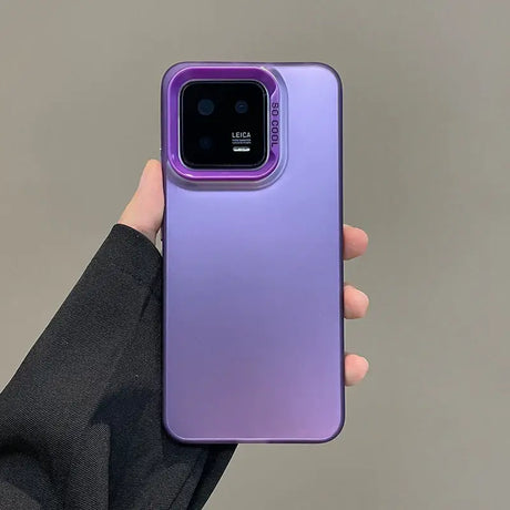 The purple case is held up in the air