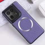 Purple fabric phone case with a black camera module and a silver magnetic ring.