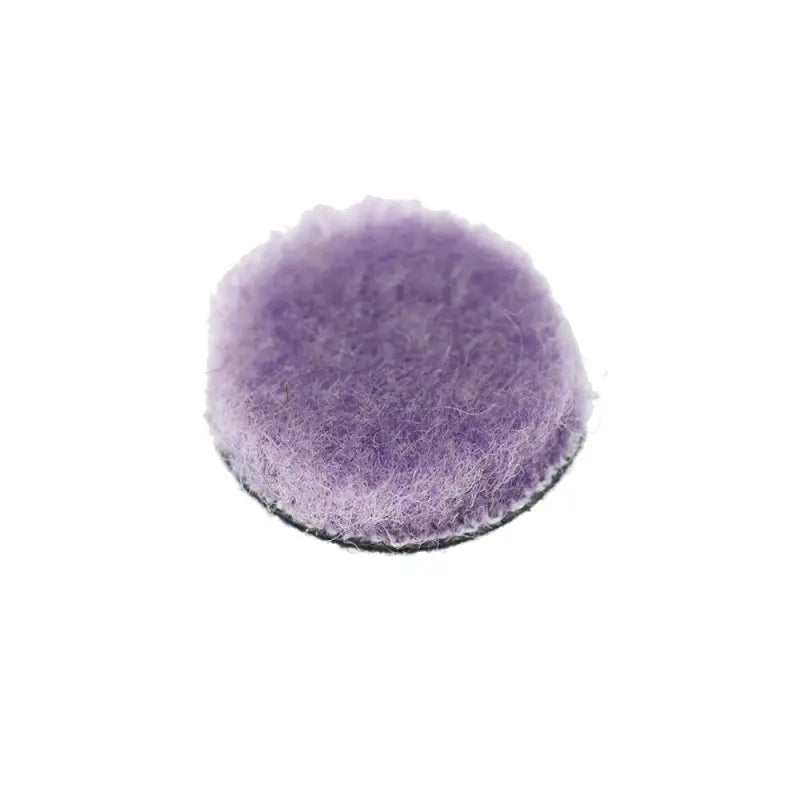a purple wool ball on a white background