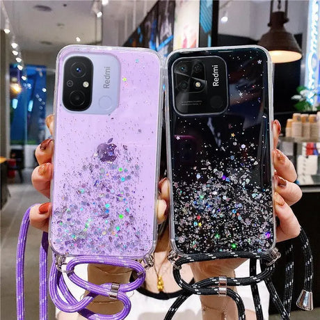 a woman holding up a phone case with glitter