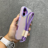 Purple gradient phone case with wrist strap.