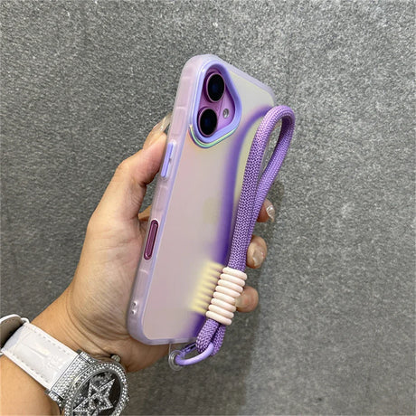Purple gradient phone case with wrist strap.
