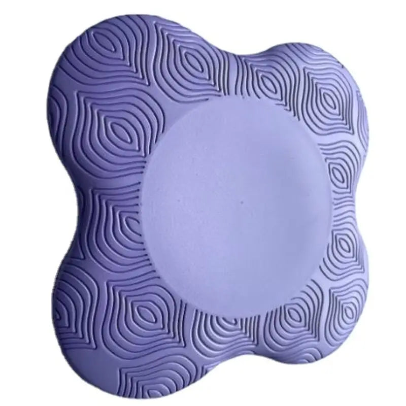 a purple plate with a circular design on it