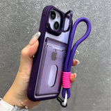 Purple iPhone case with card holder and wrist strap.
