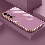 a purple iphone case with a gold frame