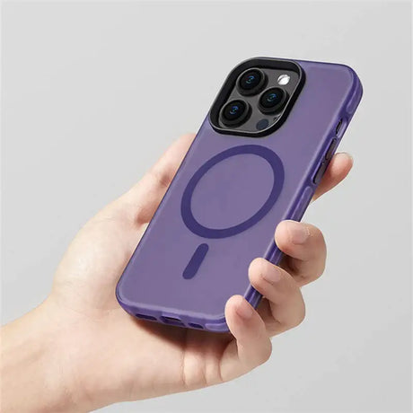 The purple iphone case is held up in a hand