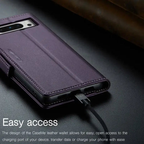 The back of a purple leather case with a black leather strap