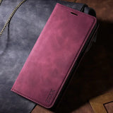 a purple leather case with chain on a brown leather background