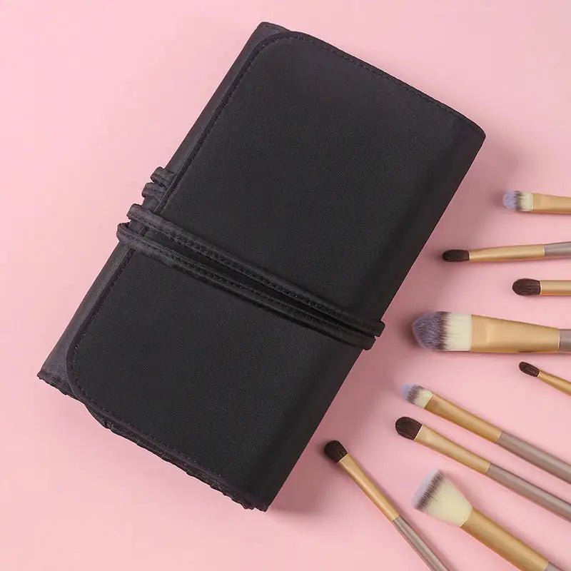 a black case with brushes and a pink background