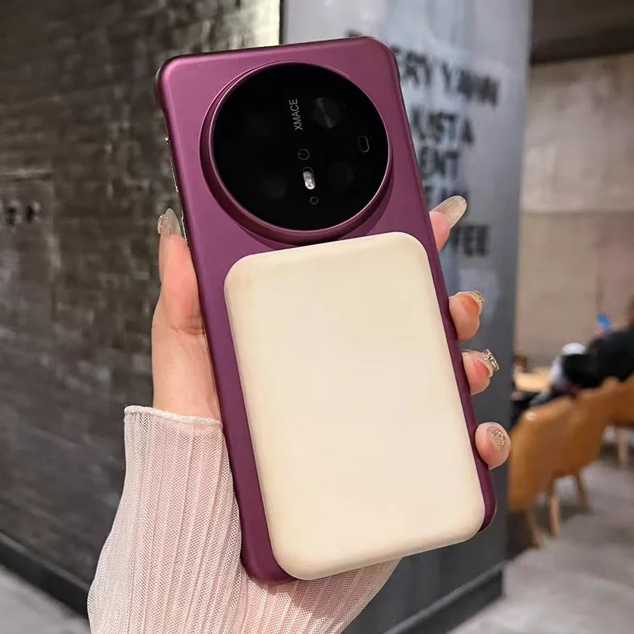 Purple phone case with circular camera module and rectangular attachment.