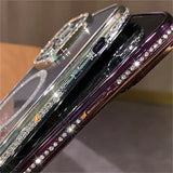 A purple phone case with diamonds on it