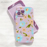 a purple phone case with a floral pattern