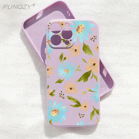 A purple phone case with a floral pattern