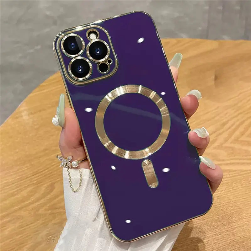 a purple phone case with a gold ring